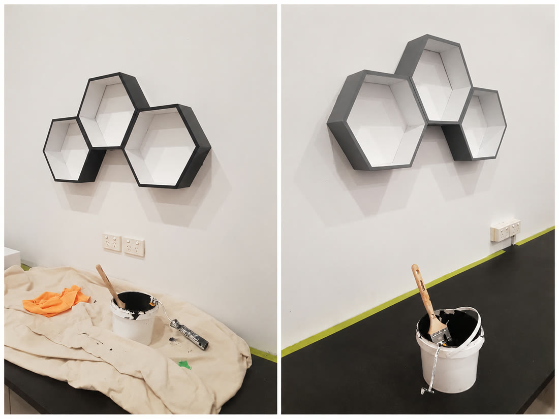 Decorative hexagon feature shelving and a crisp two-tone wall finish